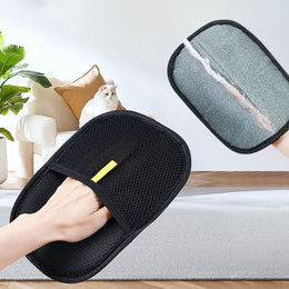 GentleGroom pet grooming mitt lifting loose fur from a pet coat